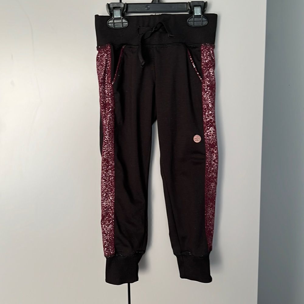 Jill Yoga black maroon glitter foil side stripe pants